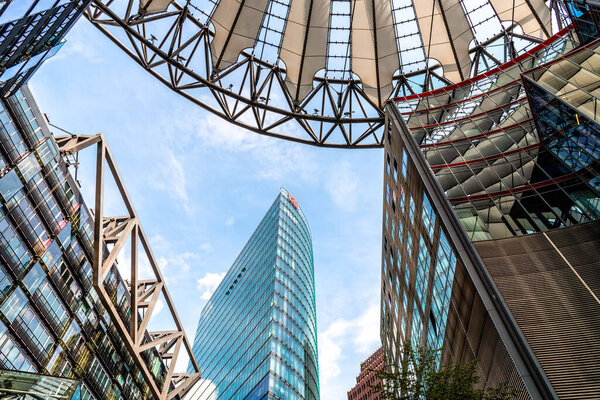 Berlin, Germany - July 28, 2019: Low angle view of the Sony Center. It is a Sony-sponsored building complex located at the Potsdamer Platz in Berlin
