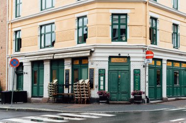 Trendy bar storefront in Grunerlokka, a trendy hipster neighborhood in central Oslo. Vinbar reataurant