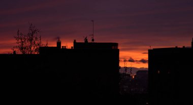 Dramatic sunset on cityscape of Madrid. Global warming concept