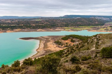 Buendia reservoir with turquoise waters in spring, Spain