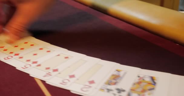 Casino Dealer Man Shuffles Poker Cards Performing Trick Cards — Stock Video