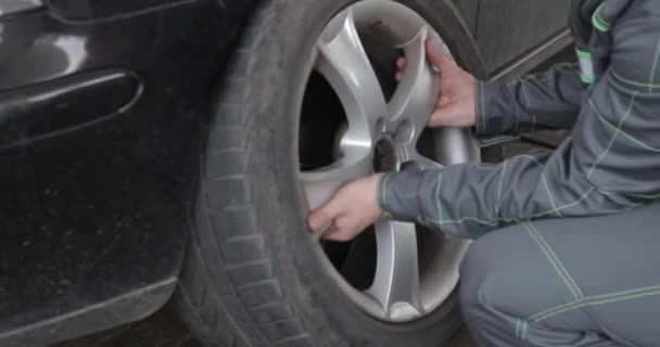 Handsome Driver Unscrewing Car Wheel Pneumatic Wrench Roadside Replace Flat — Stock Video
