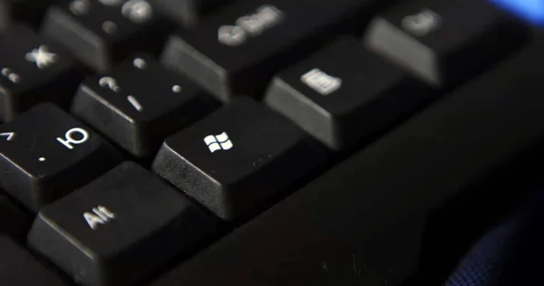 Black computer keyboard super close up stock footage. Enter keys