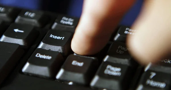 Black computer keyboard super close up stock footage. Enter keys