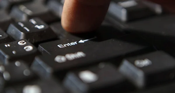 Black computer keyboard super close up stock footage. Enter keys