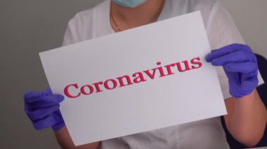 Coronavirus. Kağıt üzerinde doktor teşhisi yazıyor..