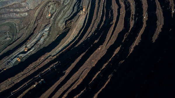 Aerial view of the Iron ore mining, Panorama of an open-cast mine extracting 