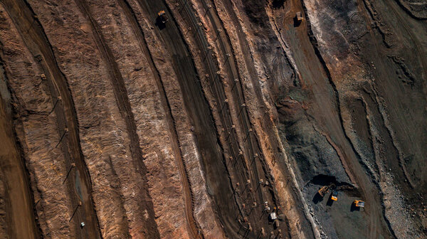 Aerial view of the Iron ore mining, Panorama of an open-cast mine extracting 