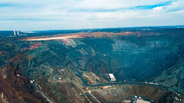 Aerial view of the Iron ore mining, Panorama of an open-cast mine extracting iron ore, preparing for blasting in a quarry mining iron ore, Explosive works on open pit