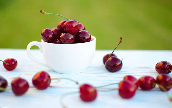 Red ripe cherry on a background — Stock Photo, Image