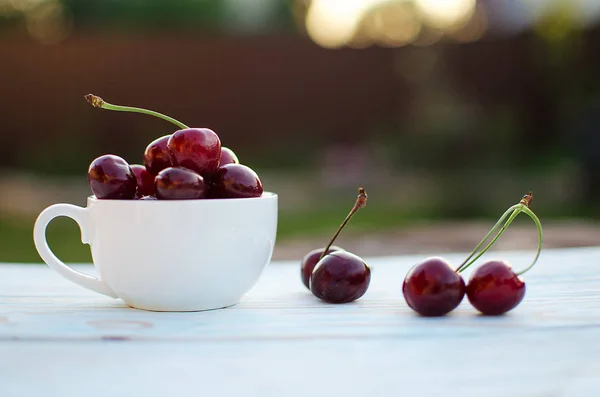 Red ripe cherry on a background — Stock Photo, Image