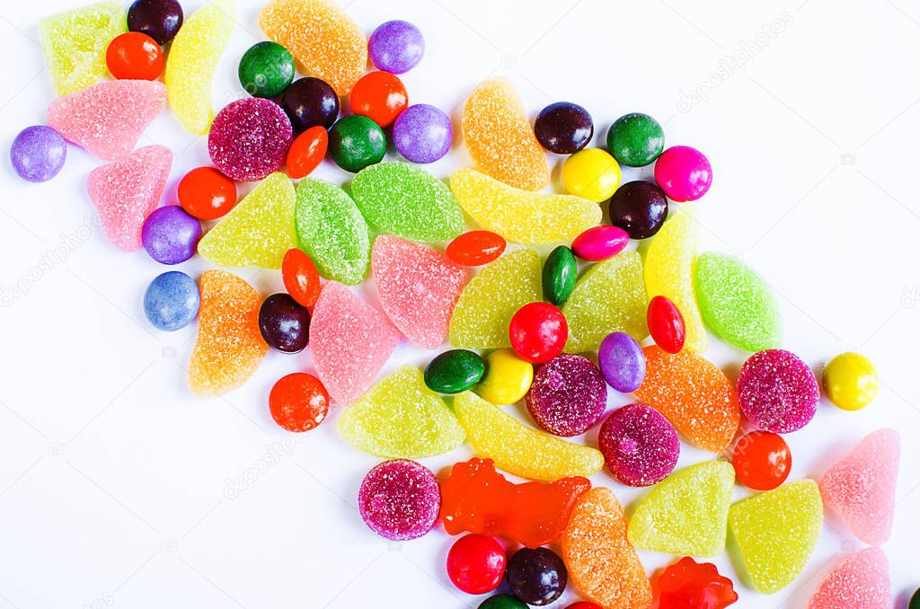Scattered colored candy on a limited 
