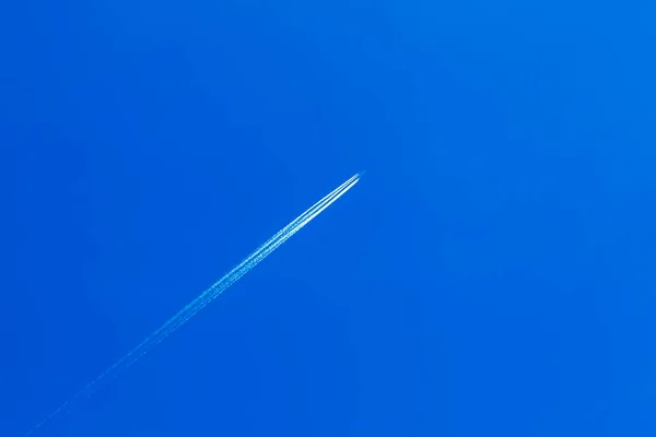 the trace of the plane in the sky