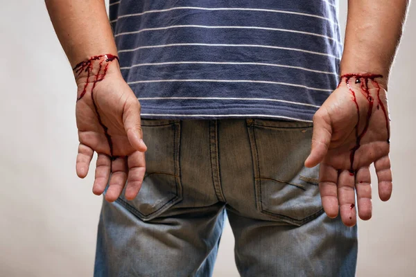 male hands, drawn cut veins and blood