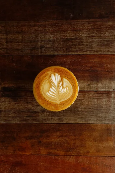 Cup of latte art coffee — Stock Photo, Image