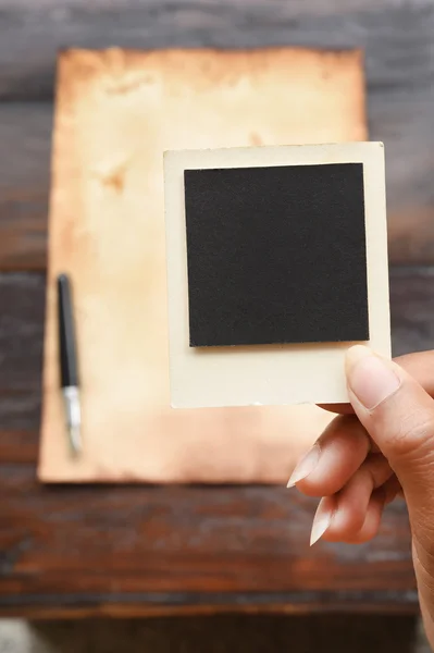 Old paper and pen with photo frame — Stock Photo, Image