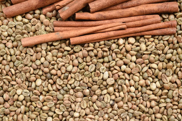 Coffee beans with cinnamon sticks — Stock Photo, Image