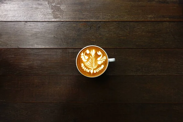 Cup of latte art coffee — Stock Photo, Image