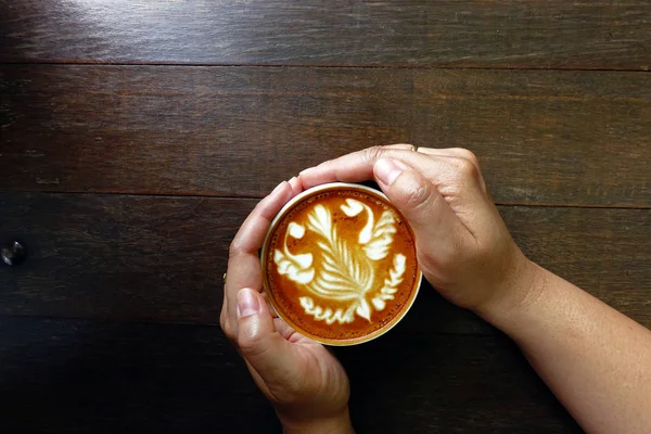 Cup of latte art coffee — Stock Photo, Image