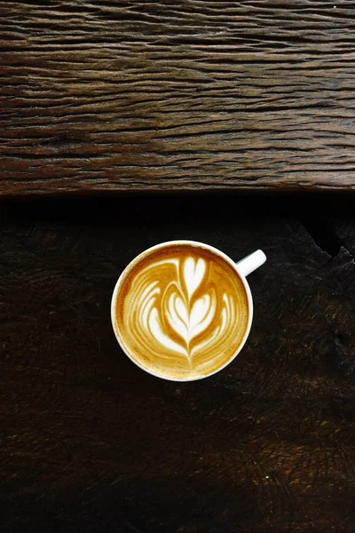 Cup of latte art coffee — Stock Photo, Image