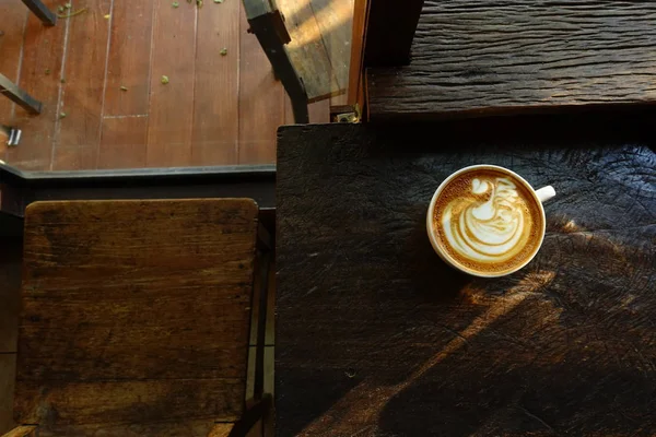 Cup of latte art coffee — Stock Photo, Image