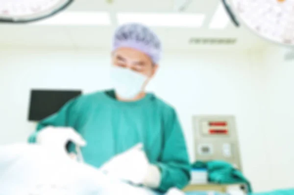 Blur of veterinarian surgery in operation room — Stock Photo, Image