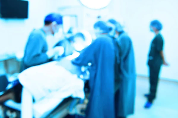 Blur of group of veterinarian surgery in operation room — Stock Photo, Image