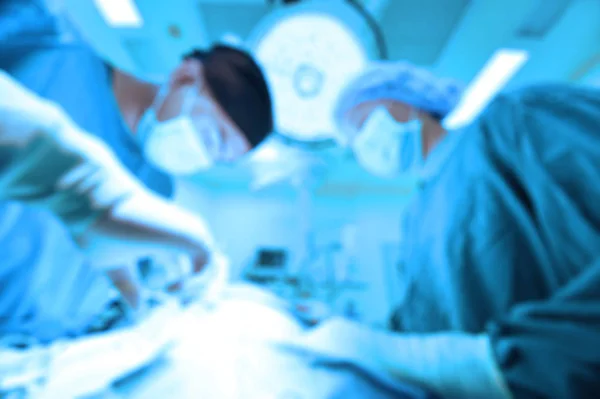 Blur of two of veterinarian surgery in operation room — Stock Photo, Image