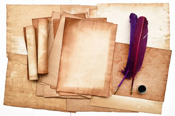 Old paper texture with feather and ink — Stock Photo, Image