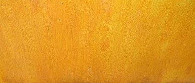 Arkaplan için sarı beton duvar dokusunu kapat                               