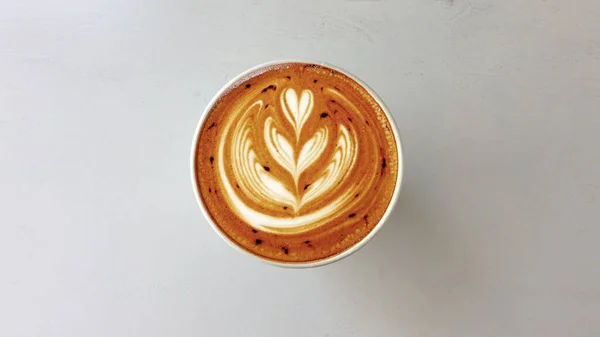 Egy Csésze Latte Art Kávé Háttérben — Stock Fotó