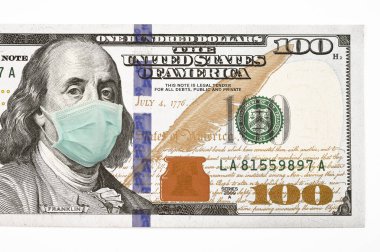 Arkaplanı yüz maskeli 100 dolarlık banknotu kapat