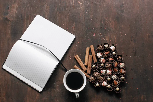 Chocolate candies and coffee — Stock Photo, Image