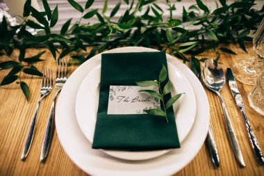 elegant table setting in restaurant for bride