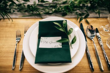 elegant table setting in restaurant for groom