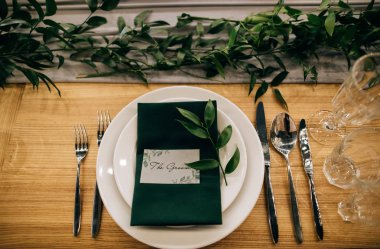 table setting in restaurant for groom