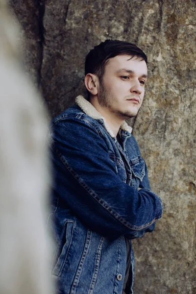 Lifestyle Portrait Young Man Denim Jacket Outdoors Rock — Stock Photo, Image