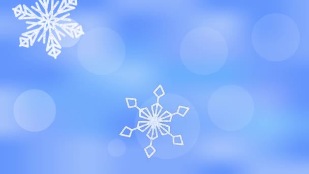 Schneeflocken fallen auf verschwommenem Bokeh-blauen Hintergrund. — Stockvideo