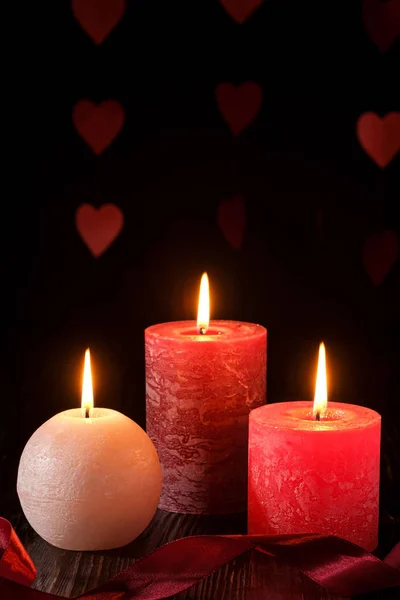 Three Wax Flame Candlelight Ribbon Dark Romantic Light Hearts Background — 스톡 사진