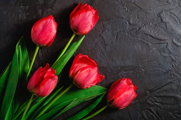 Bunch Red Tulip Flowers Textured Black Background Top View Copy — Stock Photo, Image