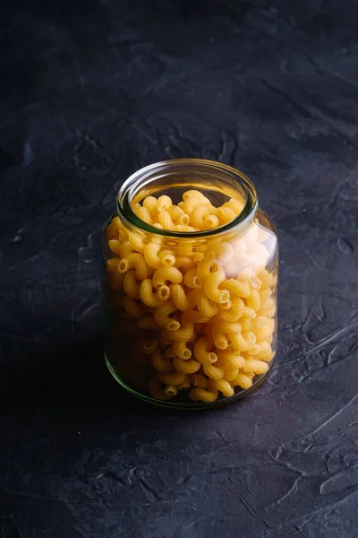 One Glass Jar Cavatappi Uncooked Golden Wheat Curly Pasta Textured — Stock Photo, Image