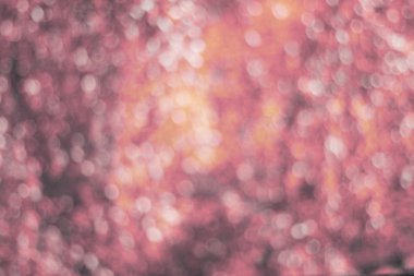 Bokeh tonlu görüntü ile deffocused pembe arka plandan yapılmış doku