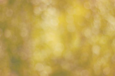 Bokeh tonlu ima ile deffocused sarı arka plan yapılmış doku