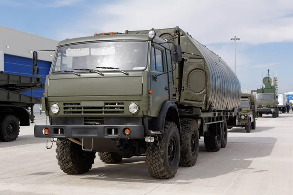 Military machines, cars and tanks on the exhibition. Heavy metal, weapon.