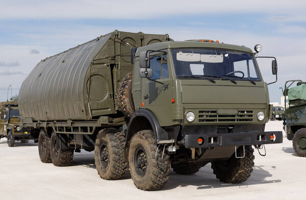 Military machines, cars and tanks on the exhibition. Heavy metal, weapon.