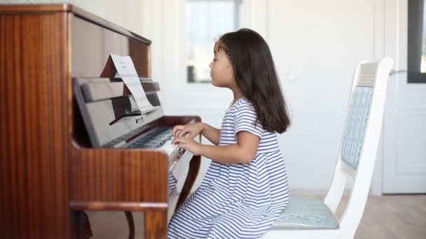 Kazakh Asian Little Girl Learning Play Piano — Stock Video