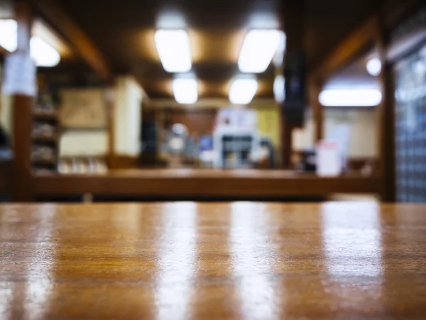 Blat licznik z niewyraźne kawiarnia restauracja wnętrza — Zdjęcie stockowe