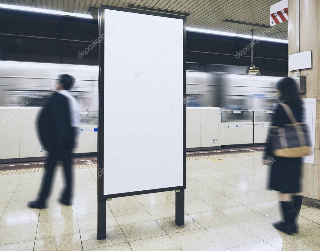 Blank Billboard Banner in Subway station with blurred people 