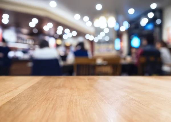 Tampo da mesa com bar desfocado restaurante café interior — Fotografia de Stock