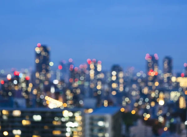 Blur City scape nacht scène skyline gebouw met verlichting — Stockfoto